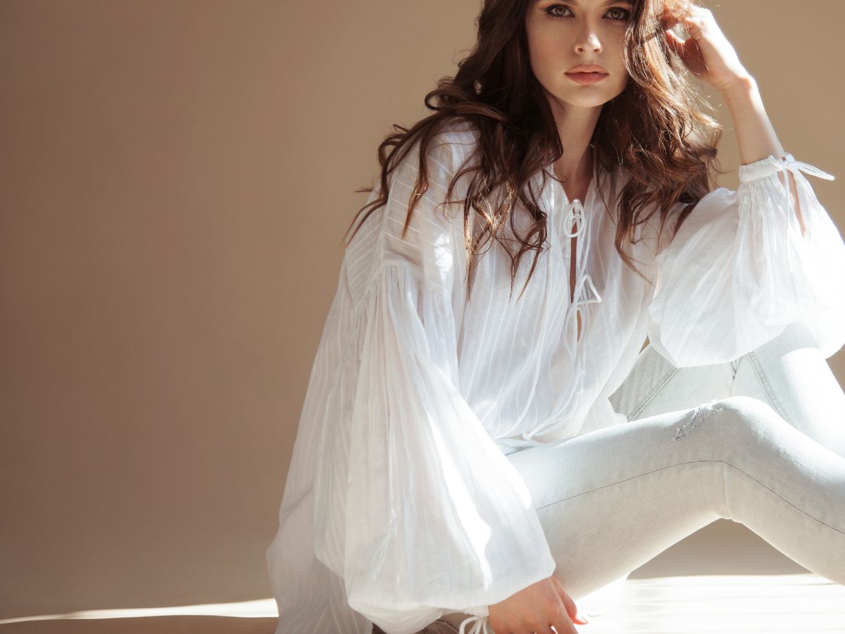 Woman in a flowy bohemian white blouse