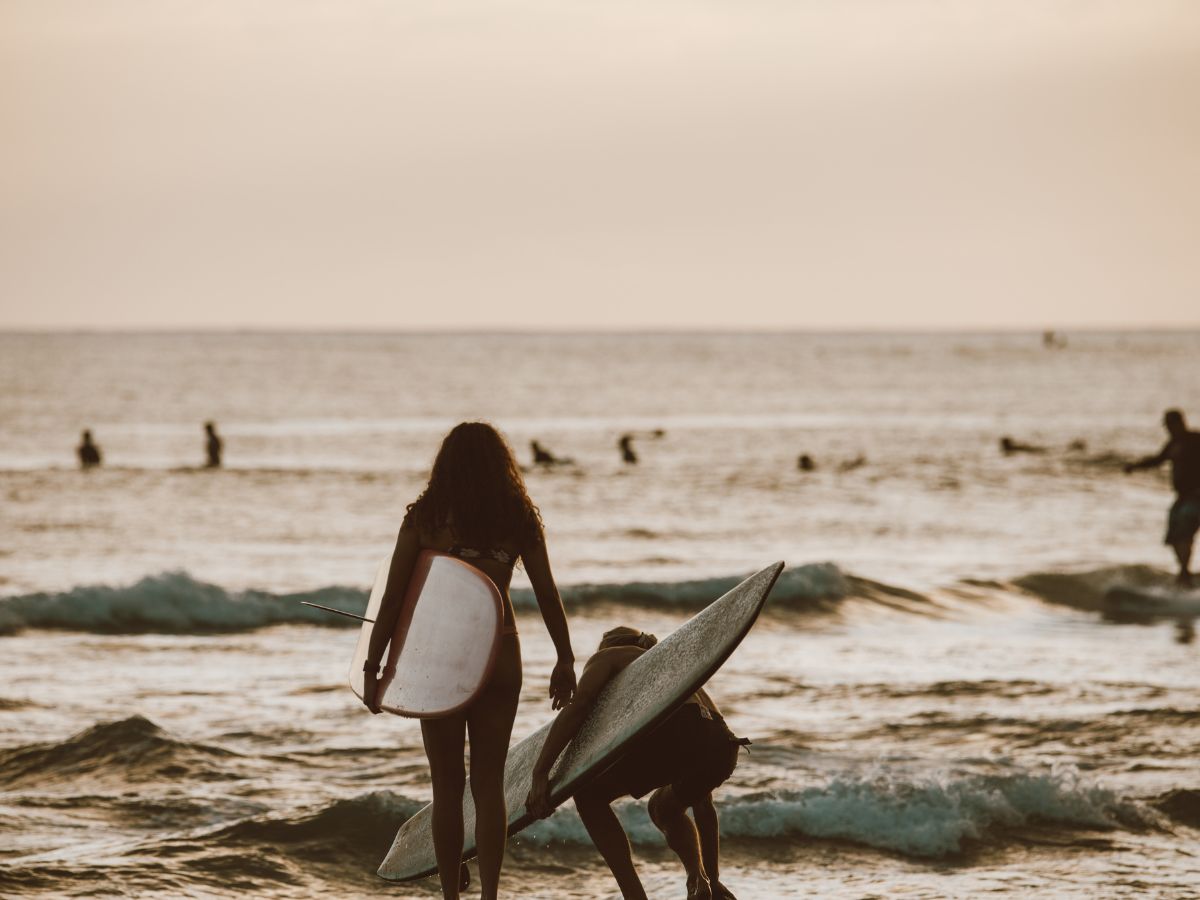 Women surfing